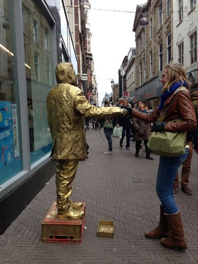 guy dressed in all gold clothes