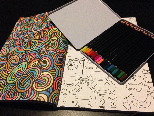 Adult coloring book with colored pencils