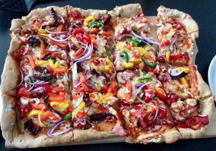 Home made pizza - half ham, half sundried tomatoes