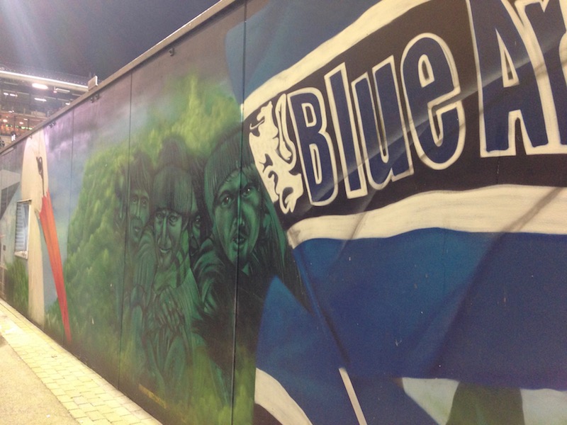 Blue Army graffiti by the stands at ADO Den Haag football game