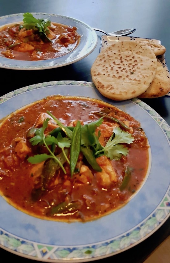 Salmon curry with naan bread