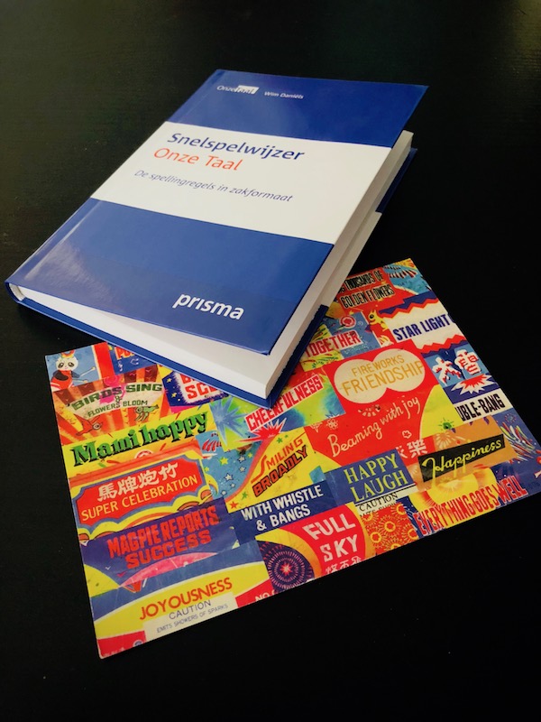 Snelspelwijzer from Onze Taal, with postcard