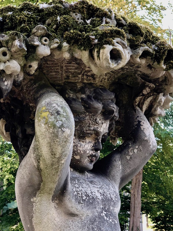 Statue of a child with flowers, Castle Bouvigne in Breda, Sept 2018